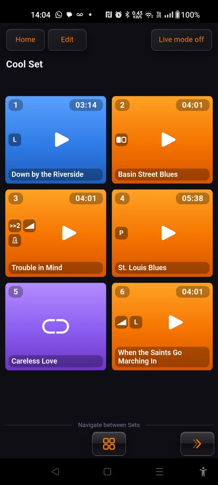 A set grid with an orange pad, a blue pad, and a purple pad showing the broken-link icon